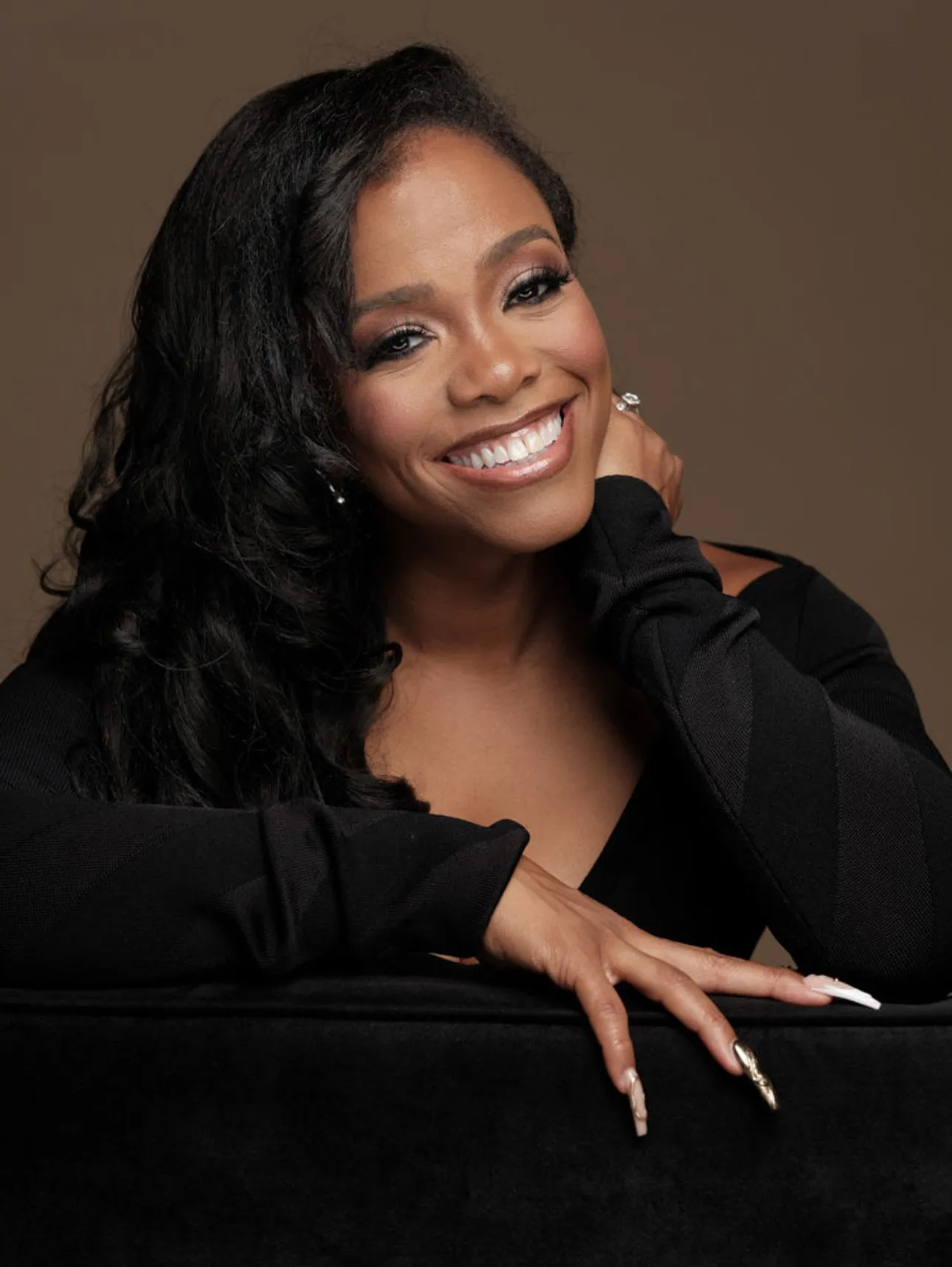 Stephanie Shabazz leaning forward, smiling