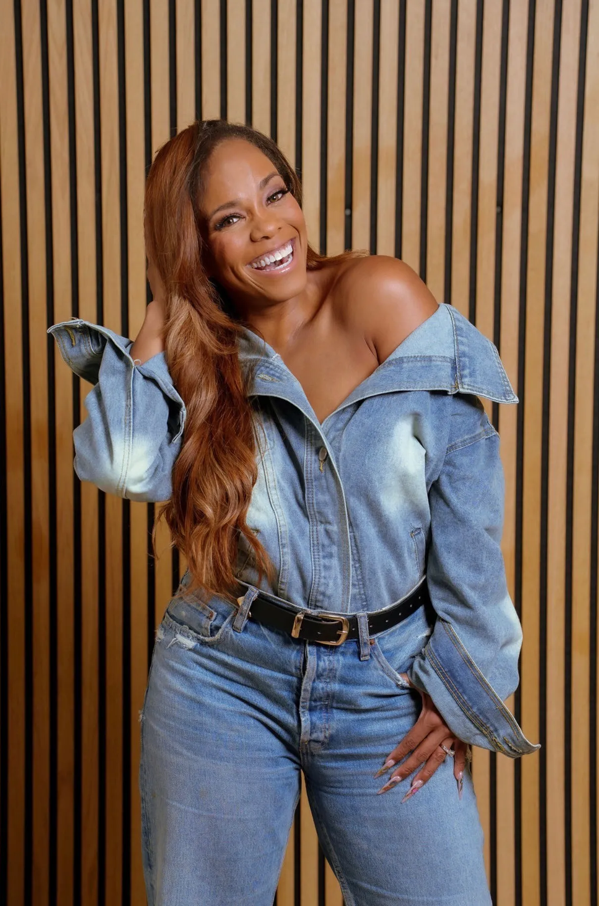 Stephanie Shabazz laughing, in denim